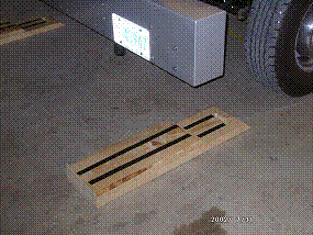 Figure 70. Photo. Support blocks. This figure shows a photograph of the blocks that are used to elevate the profiler when performing a full calibration check on the laser sensors.