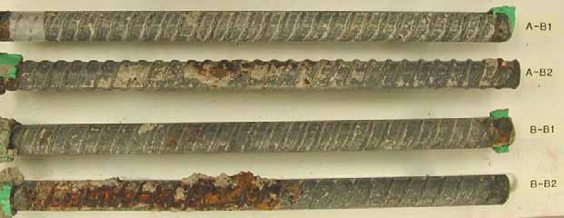 Figure 91. Slab #16 extracted rebars condition. Photo. Before autopsy, the bottom mat straight black bars show different levels of corrosion starting from no corrosion (A-B1) to moderate corrosion (B-B2).