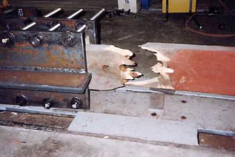 The picture shows a broken lattice element tested to destruction according to ASTM D198 tensile test.