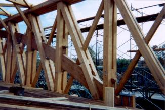 Figure 219 Main truss and arch during construction showing shouldered and wedged timber connections. Photo.