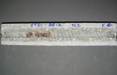 Figure 87. Photo. Upper L bar trace of dissected specimen 5-STD1-BB-1 showing corrosion products. This is a photograph of upper L bar trace of dissected specimen 5-STD1-BB-1 showing corrosion products.