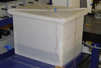 Figure 3. Photo. Test tank with cover.