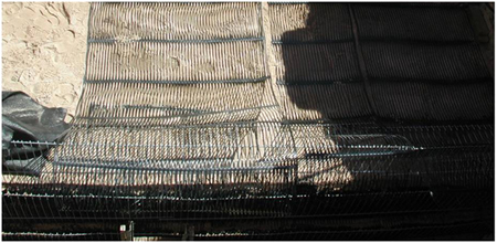 Photo. MSE extensible reinforcement (geogrid). Click here for more information.