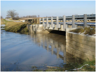 Photo. Glenburg Road Bridge under flood conditions. Click here for more information.