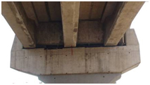 Photo. Flared wall pier of exit ramp from westbound Independencia bridge. Click here for more information.