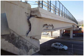 Photo. Curtain wall shear failure at abutment of Chada bridge. Click here for more information.