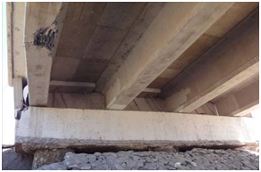 Photo. Bottom flange damage to Chada bridge. Click here for more information.