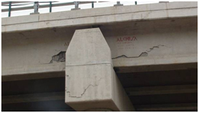Photo. Curtain wall damage at bent of Chada bridge. Click here for more information.