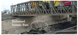 Photo. Abutment at unseated end of span in eastern approach to Llacolen bridge. Click here for more information.