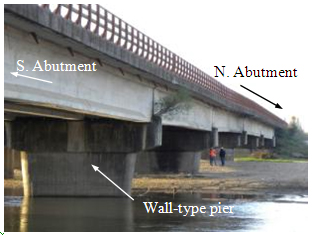 Photo. Wall-type pier beneath east Ramadillas bridge. Click here for more information.