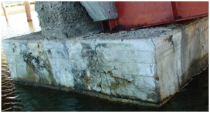 Photo. Crack in footing of Tubul bridge. Click here for more information.