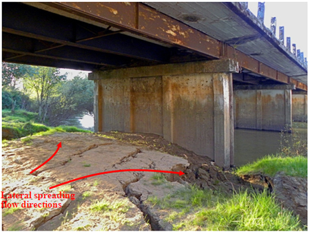 Photo. Lateral spreading and ground failure at old Ramadillas bridge. Click here for more information.