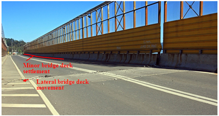 Photo. La Mochita bridge deck and girder lateral movement. Click here for more information.