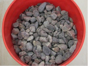This image shows the “as received” Las Placitas gravel aggregate used in mix designs. The “as received” aggregates were assessed and crushed if necessary to fit ASTM C1260 grading requirements before being used to create concrete prism samples under the ASTM C1293 testing procedure.