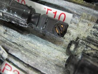This photo shows Precon HS2000V sensor 10 as found during cable dissection. The close-up image shows a clean, intact sensor facing upwards. This may have exposed the sensor to an abundance of water during the rain cycles. 