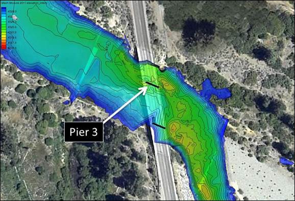 Figure 25. Photo. River bathymetry before installation of the riprap. This aerial photo shows the river with the bridge, highlighting the location of pier 3. Superimposed on the photo is the measured bathymetry.