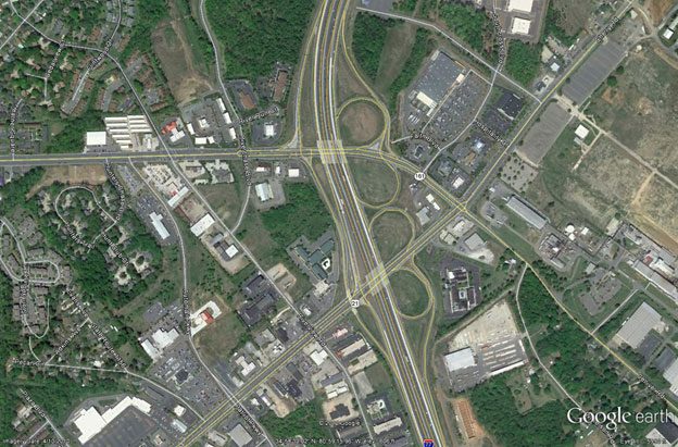 This figure shows an aerial photo of an interchange in South Carolina with four loop ramps.