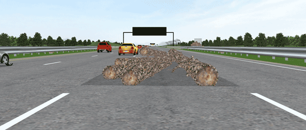 Figure 42. Screen capture. Driver's view of spilled load from 128 ft (39 m).