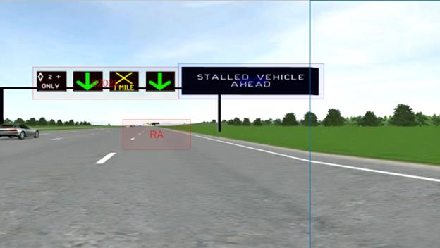 Figure 56. Screen capture. ROIs indicated on the ATM signs. This figure shows a screen capture of the driving simulator with active traffic management signs over a four-lane road with a changeable message sign (CMS) on the gantry to the right. From left to right the signs show: high-occupancy vehicle 2+, normal operations, lane closure 1 mi ahead, and normal operations. The CMS shows â€œSTALLED VEHICLE AHEAD.â€� The following three regions of interest are highlighted: -ATM left includes the four ATM signs. -ATM right includes the CMS. -Road ahead indicates the lane of travel ahead of the simulated vehicle.