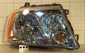 Photo. Front view of HID 2 headlamp (high/wide). Click here for more detail.