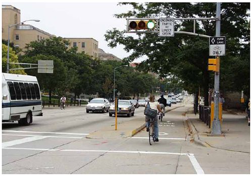 Contraflow bike lane with bicycle-specific signal in Madison, WI.
