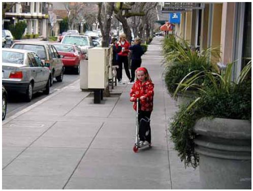 Parked cars can also serve as a buffer between the sidewalk and the street.