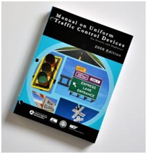 This photo shows the cover of the Manual on Uniform Traffic Control Devices (MUTCD).