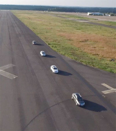 The Cadillac fleet running test maneuvers on the runway in Willow Grove, PA.