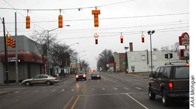 After the RSA, three traffic signal heads were suspended on a box span of wire directly over the travel lanes, with two signals for the through lane and one for the left turn lane