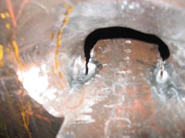 Figure 11: Tab removal site at location 3G after exploratory grinding. Magnetic particle indications no longer appear.