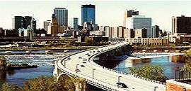 Image of a metro skyline and highway.