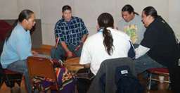 Caption: Photo of Redrock Drum Group performing during the ceremony.