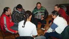 Caption: Photo of All Nations Drum Group performing during the ceremony.