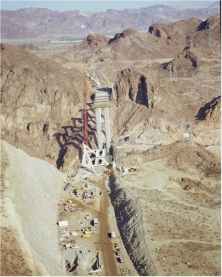 This photo shows the Colorado River bridge under construction, a part of CFLHD’s complex Hoover Dam Bypass project. (CFLHD photo)