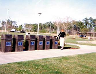 ; Photo of a row of recycling receptacles that NC DOT provides at rest areas and welcome centers.