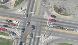 Aerial photo of a four way intersection.