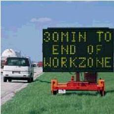 Photo showing a lighted sign informing drivers of the distance to the end of a work zone.