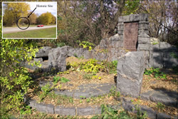 This photo depicts the deteriorated and neglected condition of a historic roadside development feature that needs restoration along TH 10 near St. Cloud.