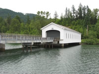 View of Lowell Covered Bridge. Constructed in 1945, the Lowell Covered Bridge is listed in the National Register of Historic Places.