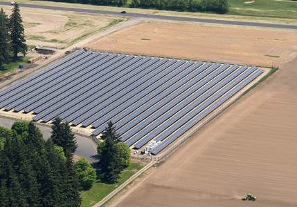 Photo of rows of solar panels.