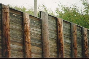 Photo of a wooden noise barrier with tongue and groove planking