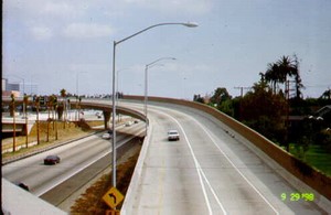Photo of a noise barrier on a bridge from the highway