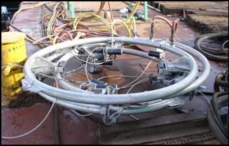 A bubble curtain air release ring. This is a ring of round pipe that has specifically sized holes that release compressor provided air.