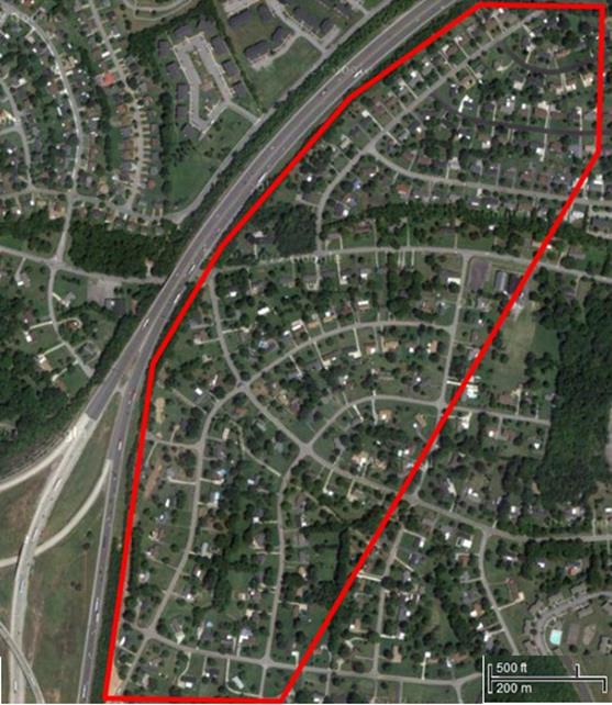 Study Area A: Ten-lane highway with dense development close to the highway. The road is on a slight fill and there are several rows of relatively closely spaced houses