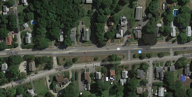 Aerial photo showing residences along Front Street that would have been benefited by a barrier between Front Street and Route 18, Weymouth/Abbington, MA 