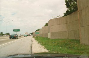 Photo of a pre-cast concrete free standing noise barrier