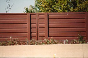 Photo of a metal noise barrier with horizontal texture