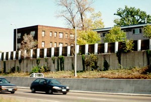 Photo of a cast-in-place concrete noise barrier retaining wall combination