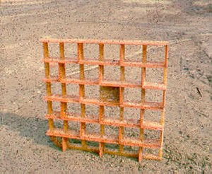 Photo showing the template for a concrete pre-cast noise barrier stamped brick surface finish
