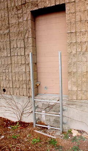 Photo of a noise barrier panel with an access door
